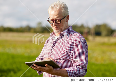 senior man with tablet pc computer at county senior man with tablet pc computer at county 28755557