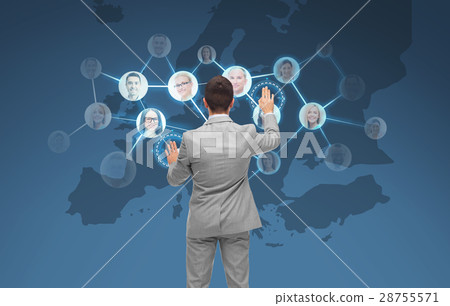 businessman using virtual screen with contacts businessman using virtual screen with contacts 28755571