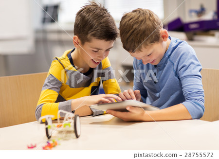 kids with tablet pc programming at robotics school kids with tablet pc programming at robotics school 28755572