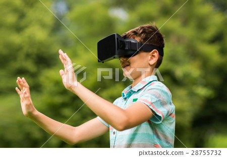 boy with virtual reality headset outdoors boy with virtual reality headset outdoors 28755732