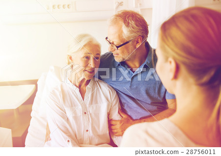 happy family visiting senior woman at hospital happy family visiting senior woman at hospital 28756011
