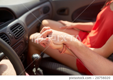 close up of happy couple driving in cabriolet car close up of happy couple driving in cabriolet car 28756020