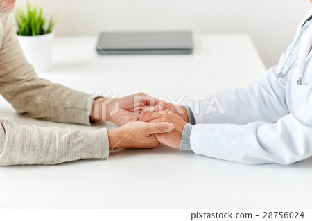 close up of doctor holding old man hand close up of doctor holding old man hand 28756024