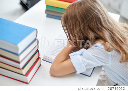 close up of student girl with many books at school close up of student girl with many books at school 28756032