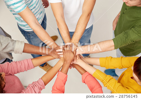 group of international people with hands together 28756145