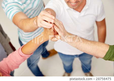 international group of people making high five 28756475