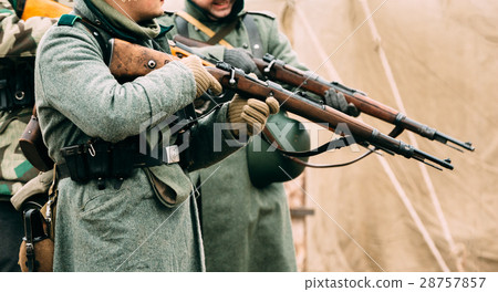 Wehrmacht soldiers with rifles in their hands 28757857