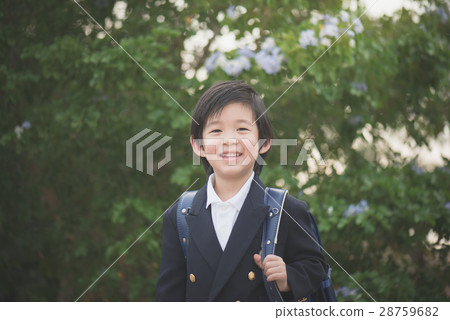 Asian student with backpack look up Asian student with backpack look up 28759682