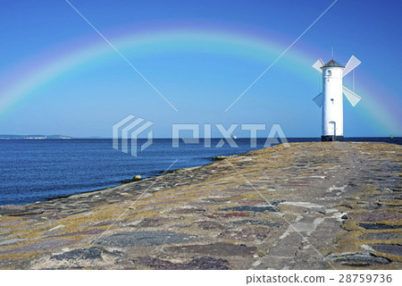 Swinoujscie, town's landmark with rainbow 28759736
