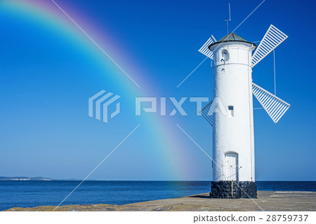 Swinoujscie, town's landmark with rainbow 28759737
