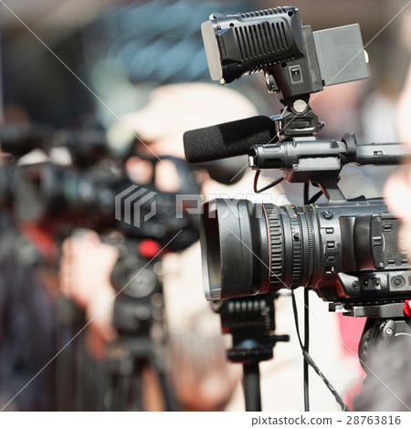 TV cameras at press conference 28763816