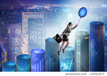 Businesswoman flying on hot balloon over graph Businesswoman flying on hot balloon over graph 28763873