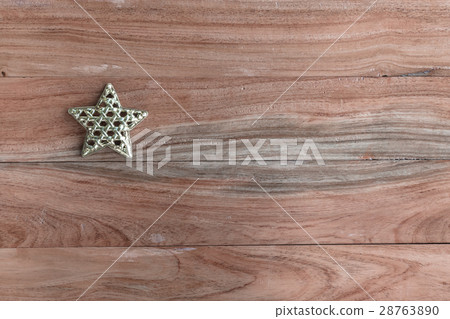 Gold star on wood top view Gold star on wood top view 28763890