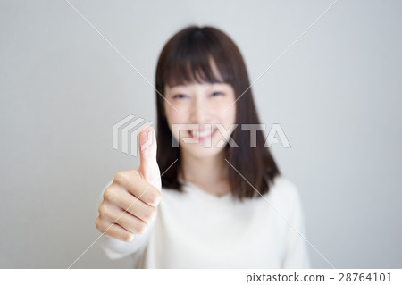 A woman who makes a "good" pose A woman who makes a "good" pose 28764101