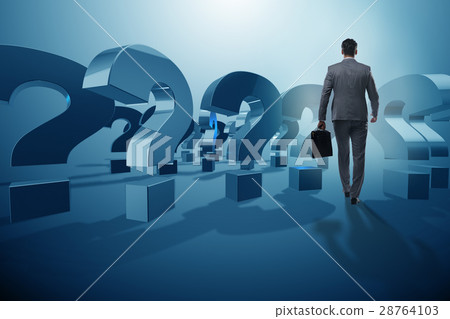 Businessman in uncertainty concept with question Businessman in uncertainty concept with question 28764103