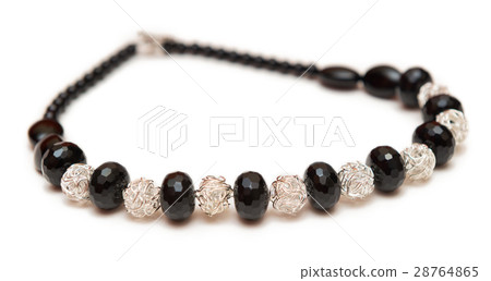 Elegant jewellery isolated on the white background Elegant jewellery isolated on the white background 28764865