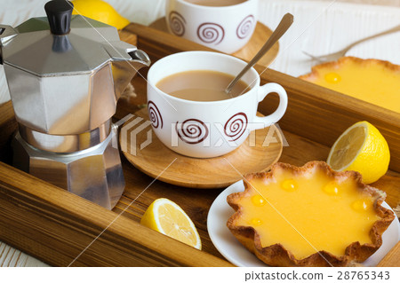 lemon tarts and coffee 28765343