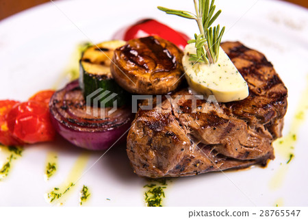 thick steak with rosemary and fried vegetables thick steak with rosemary and fried vegetables 28765547