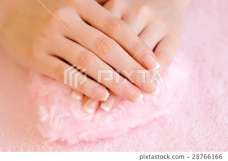Woman hands with beautiful french manicure 28766166