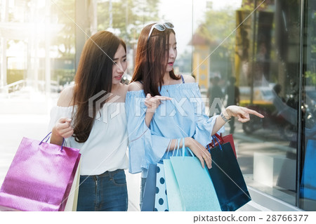 friends shopping in holiday time with outdoor. friends shopping in holiday time with outdoor. 28766377