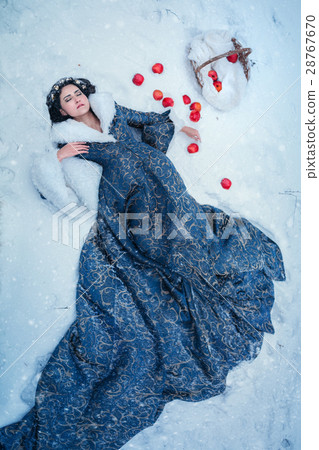 Portrait of young woman dressed in blue coat Portrait of young woman dressed in blue coat 28767670