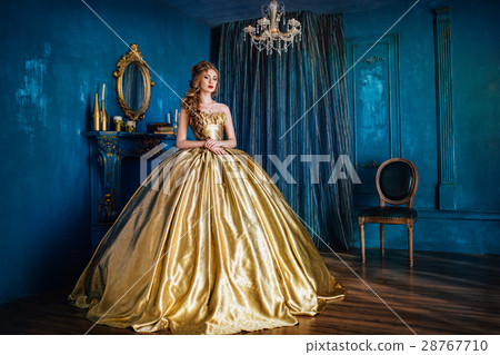 Beautiful woman in a ball gown 28767710
