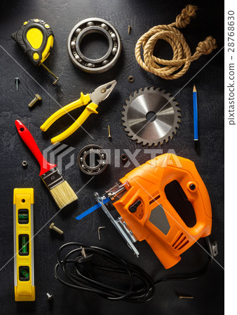 jig saw and tools on black jig saw and tools on black 28768630