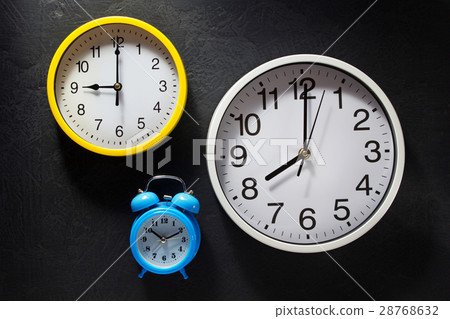 wall and alarm clock at black background wall and alarm clock at black background 28768632