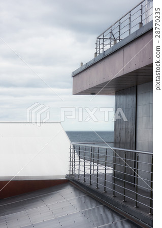 The house on the Baltic Sea in cloudy weather The house on the Baltic Sea in cloudy weather 28770235