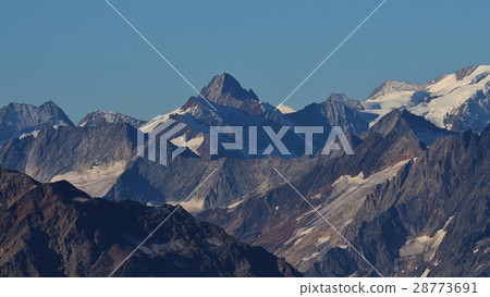 Mountain peaks of the Swiss Alps in summer Mountain peaks of the Swiss Alps in summer 28773691