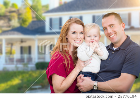 Young Military Family in Front of Their House Young Military Family in Front of Their House 28776194