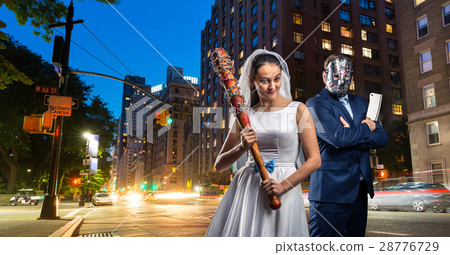 Couple with bat and meat cleaver in night city Couple with bat and meat cleaver in night city 28776729