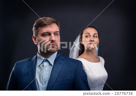 Beautiful newlyweds studio photo shoot Beautiful newlyweds studio photo shoot 28776738