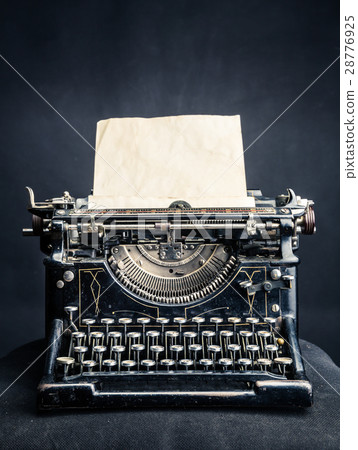 Vintage black typewrite with inserted paper sheet Vintage black typewrite with inserted paper sheet 28776925
