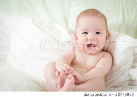 Mixed Race Baby Boy Having Fun on His Blanket 28776950