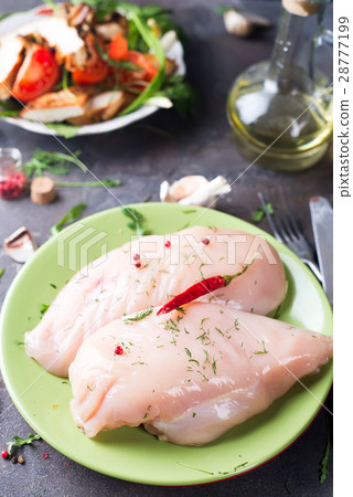 Raw cut chicken fillet Raw cut chicken fillet 28777199