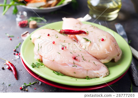 Raw cut chicken fillet Raw cut chicken fillet 28777203