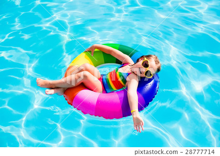 Child with toy ring in swimming pool Child with toy ring in swimming pool 28777714