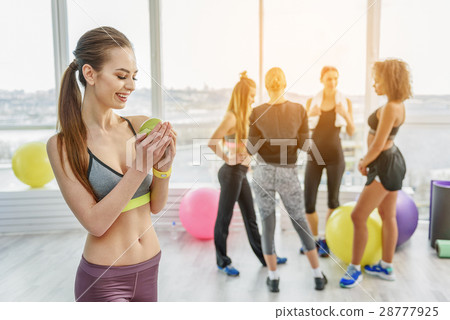 Merry sportive girl in gym 28777925