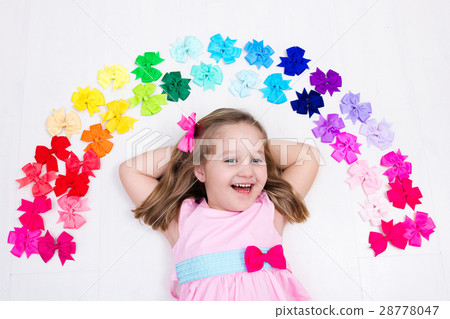 Little girl with colorful bow. Hair accessory Little girl with colorful bow. Hair accessory 28778047