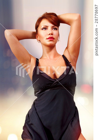 woman at evening time in black dress woman at evening time in black dress 28778697