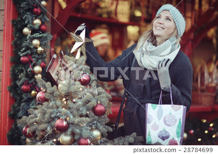 Dreaming woman in winter city a festive mood 28784699