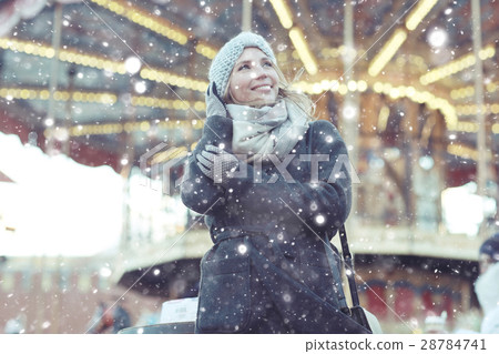 happy girl with snowflakes Christmas winter portrait 28784741
