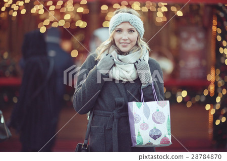 happy woman buys gifts for the new year happy woman buys gifts for the new year 28784870