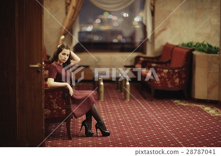 lonely sad woman in the hotel interior lonely sad woman in the hotel interior 28787041
