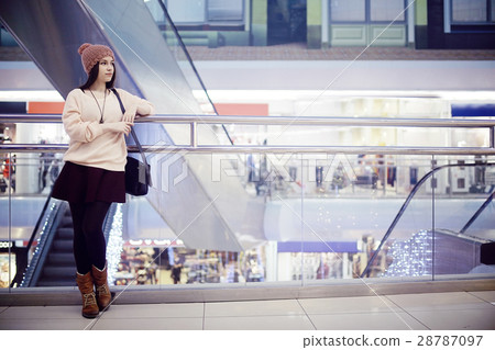 young girl's winter sale shopping center 28787097