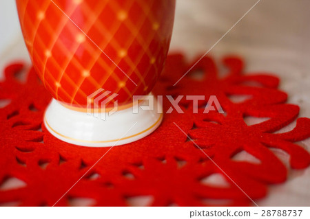 Mug is on a napkin 28788737