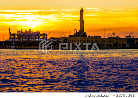 The lighthouse  of Genoa at sunset, Italy 28793391
