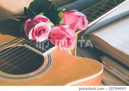 Rose flowers on a guitar Rose flowers on a guitar 28794695