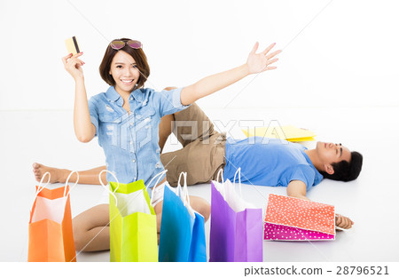 young Couple with shopping bags and credit card young Couple with shopping bags and credit card 28796521